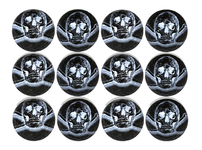 silver skulls and crossed bones on black golf ball